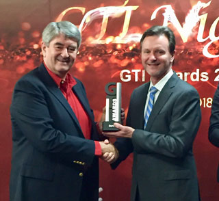 Qorvo’s Eric Creviston accepts the GTI 2017 award for Qorvo, at MWC 2018